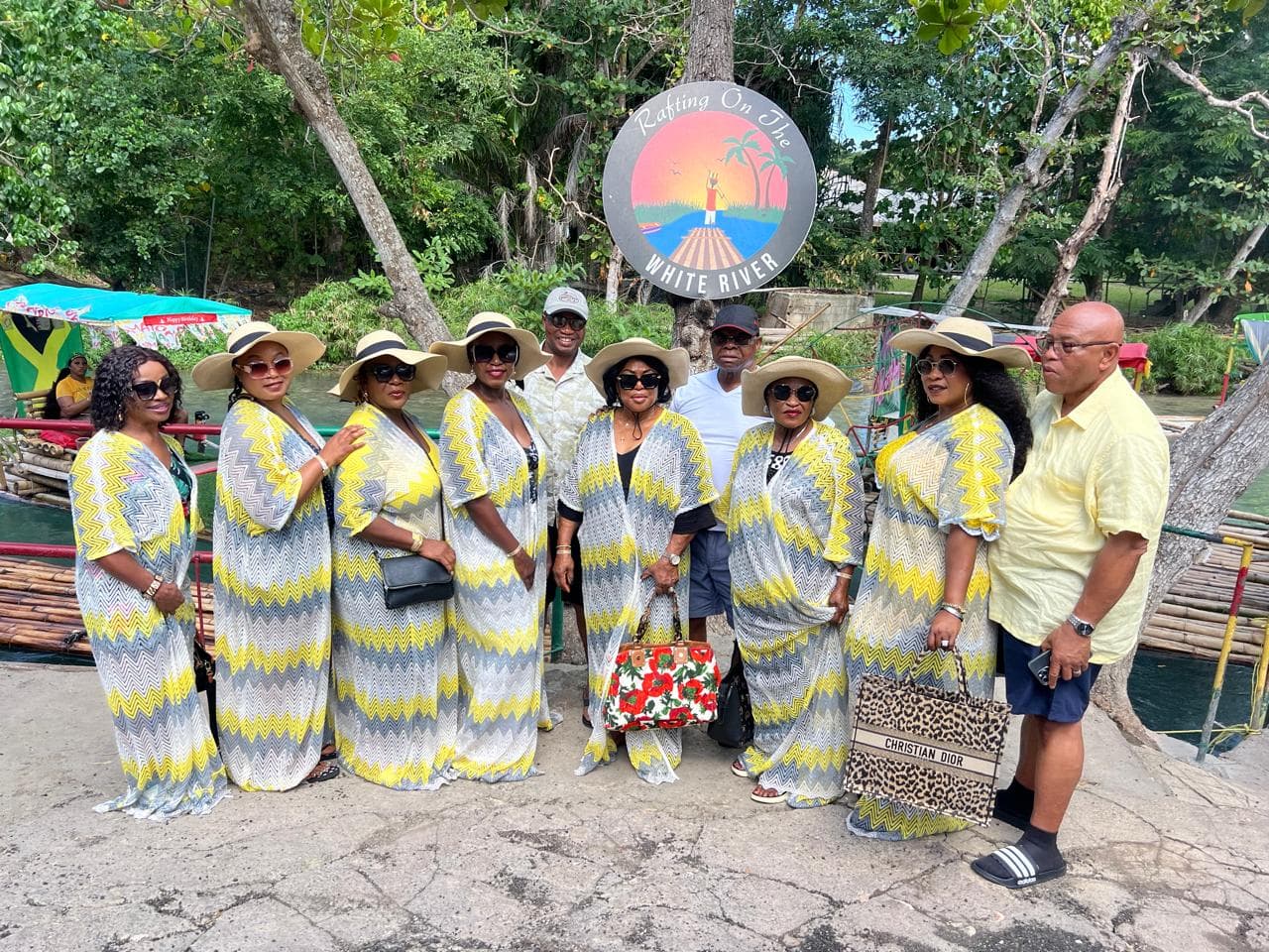 Guest group at the Rafting on the White River sign